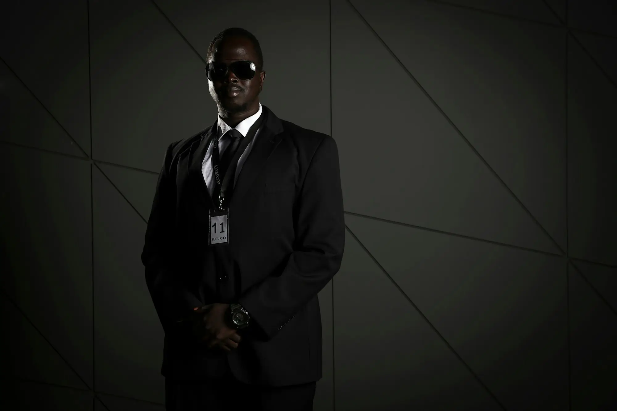 Protection officer in a dark suit
